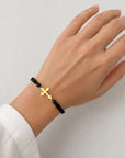 14k gold 20mm cross with 4mm black beads and braided bracelet