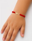 14k gold simply cross and string bracelet
