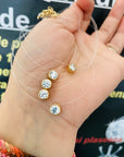Clear string with 14k gold round 6mm white stone necklace