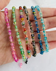 14k gold 2mm beads and different multicoloured beads faced bracelet