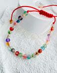 14k gold 2mm beads and different multicoloured beads faced bracelet