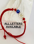 14k gold 2mm gold beads with shell letter and evil eye bracelet