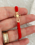 14k gold simply  cross   and  string bracelet