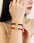14k gold Letter and butterfly with  string bracelet