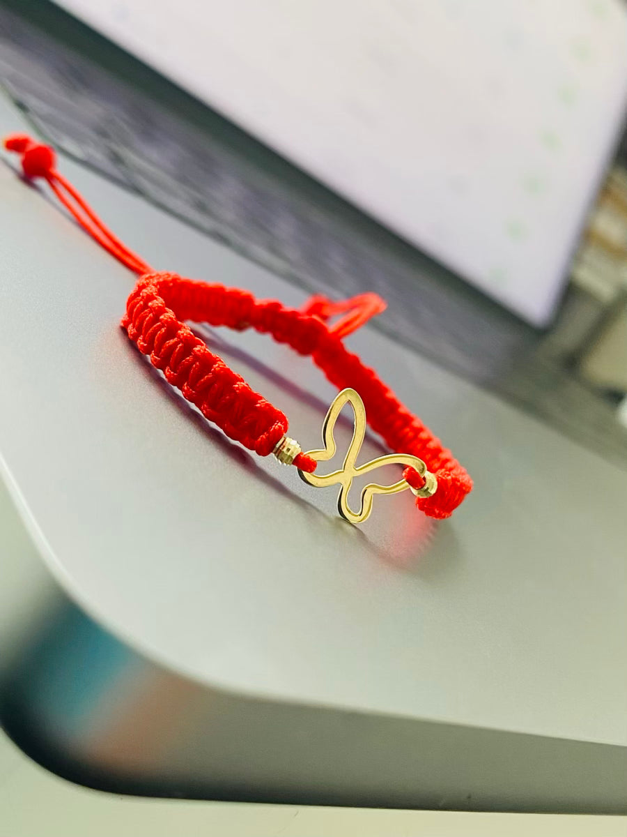 14k gold butterfly   and 2.5mm beads  and string bracelet