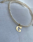 ALL LETTERS   14k gold Letter with clear  string size 39cm necklace