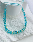14k gold 2mm beads and different multicoloured beads faced bracelet